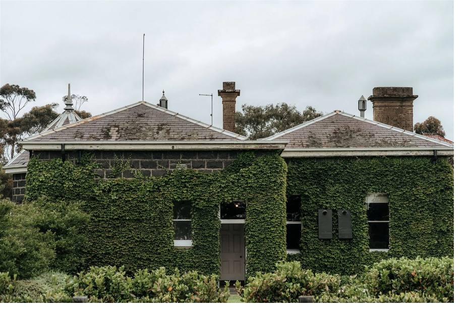 Main homestead — ivy-covered stone building